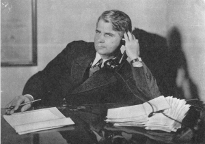 Saunders at desk